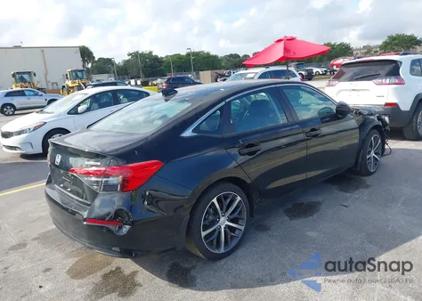 2024 Honda Civic Touring z USA, uszkodzony, nr VIN 2HGFE1F92RH318686